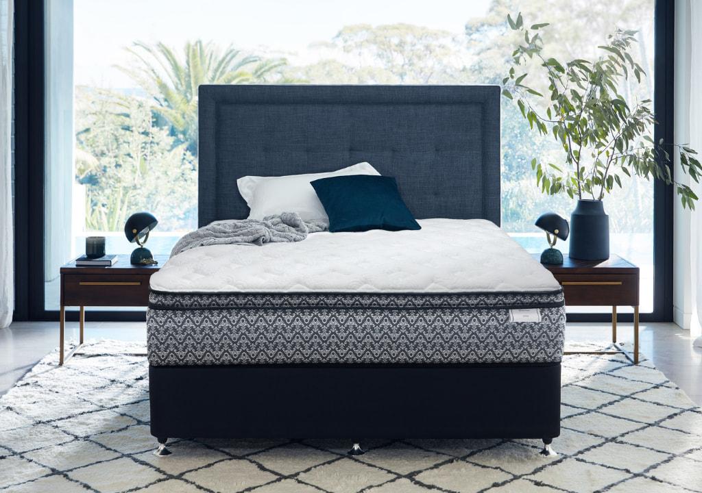 Sealy Posturepremier mattress in a bedroom.