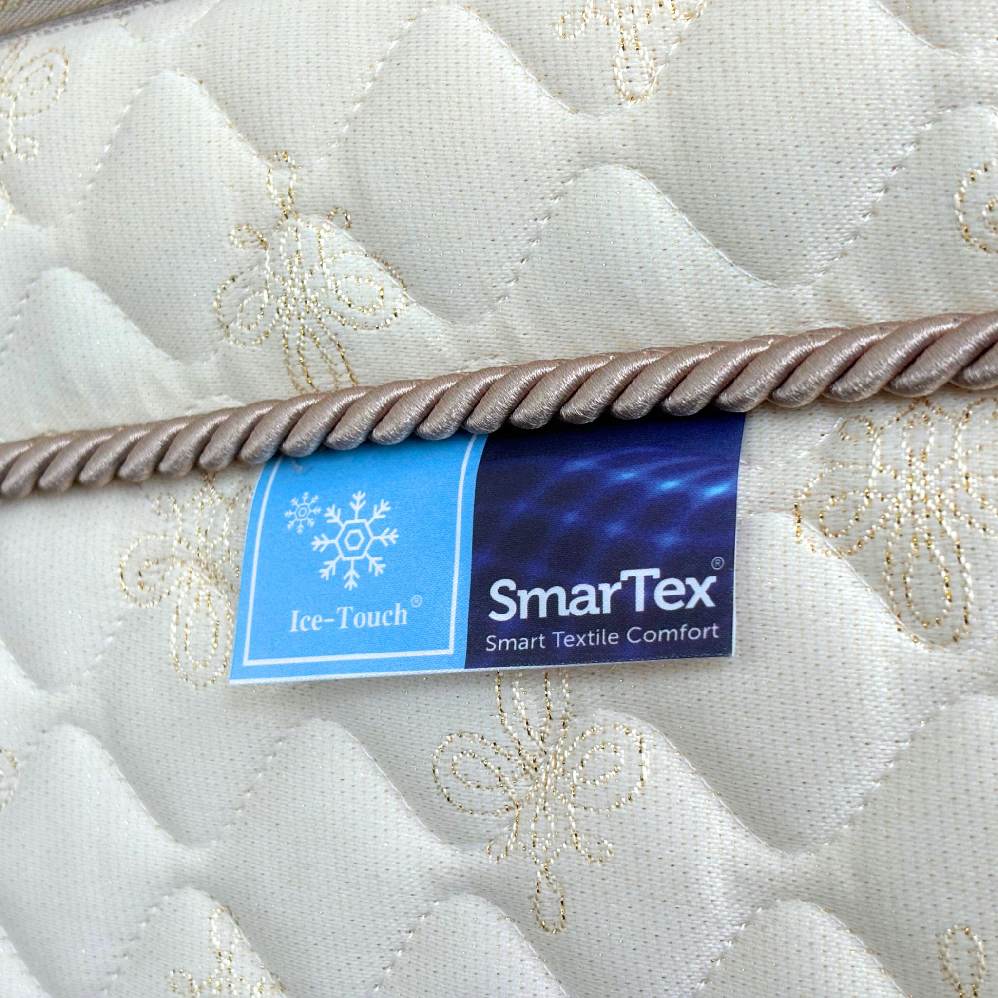 Best Luxury Mattress Malaysia 2026: What Sets Premium Sleep Apart 3 Close-up of Sealy SmarTex with Ice-Touch cooling fabric labels on a Posturepedic Exquisite luxury mattress