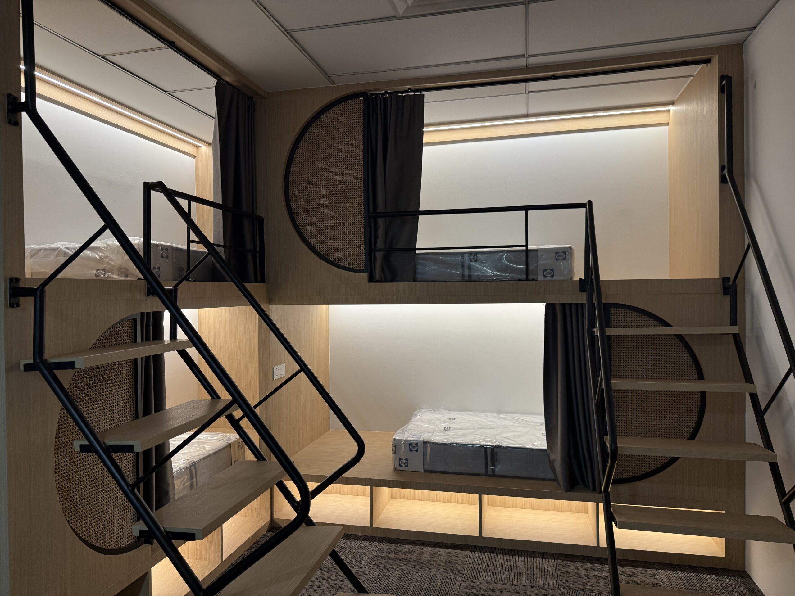 How Long Should a Power Nap Be? 8 Interior of a Sealy nap pod fitted with a mattress and soft ambient lighting ready for a power nap